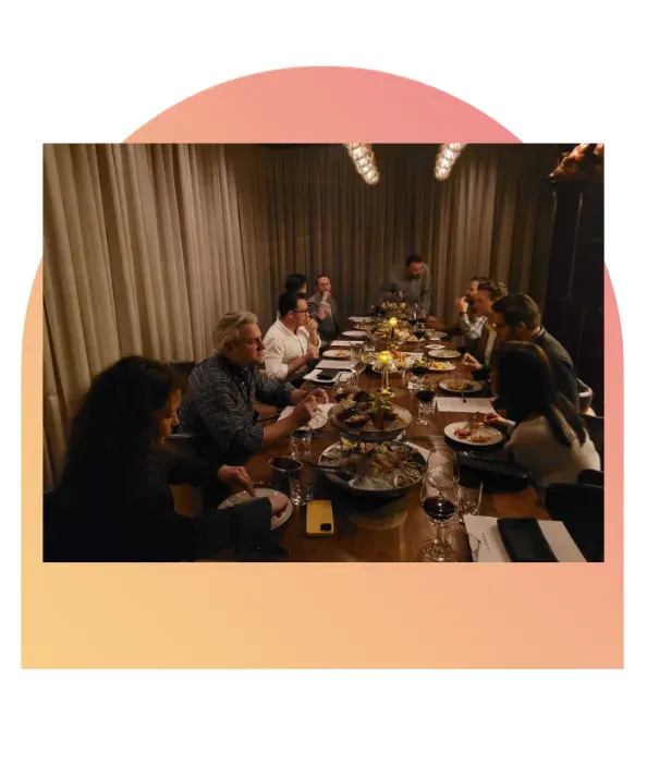 chart Guests gathered around a dinner table at Lavanda’s OPTECH steak and wine evening.