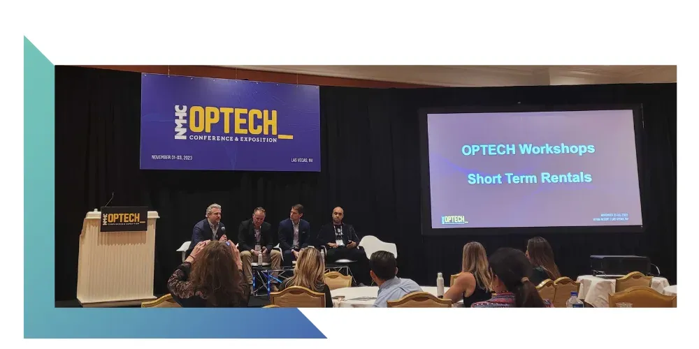 chart A panel discussion at the OPTECH 2023 conference.
