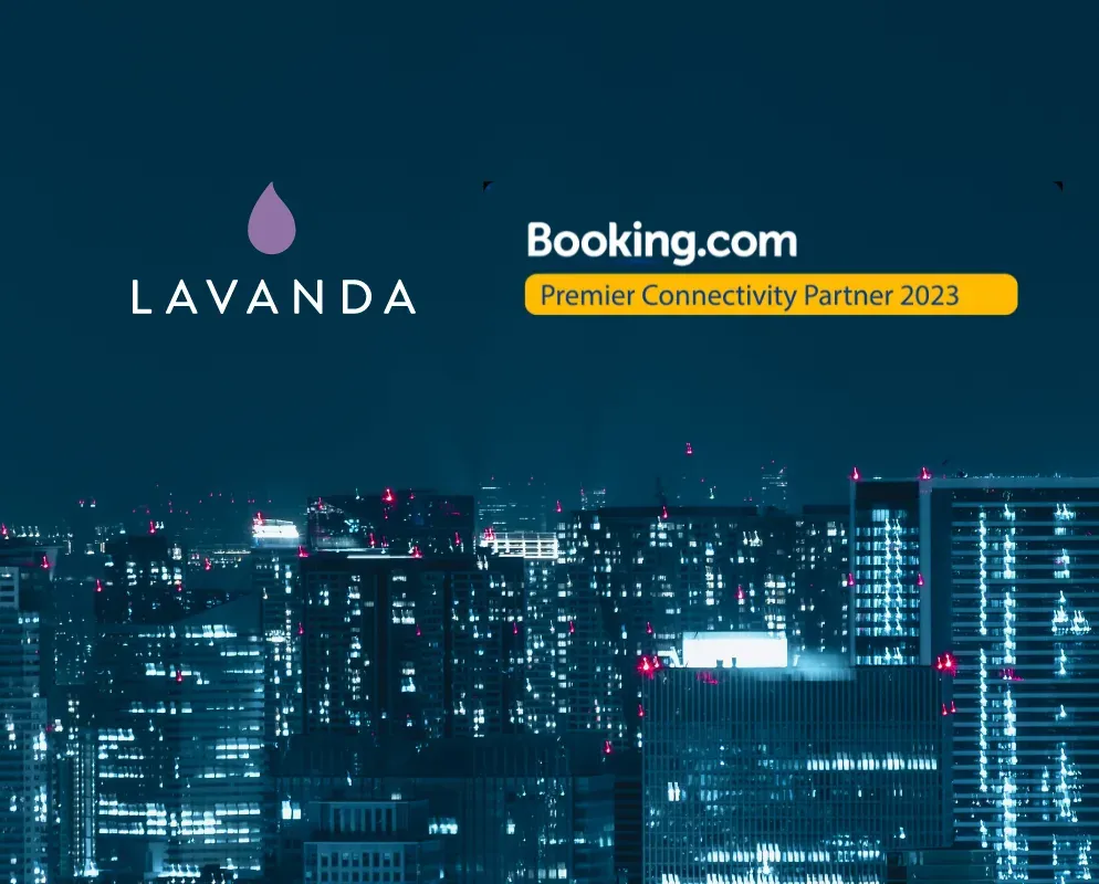 The Lavanda and Booking.com marks over a night-time city skyline, with a badge reading Premier Connectivity Partner 2023.